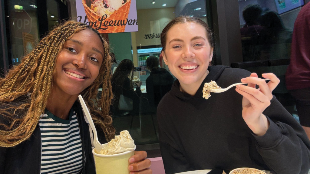Two WOW students enjoying some ice cream showing the friendships that can be built through the program. 
